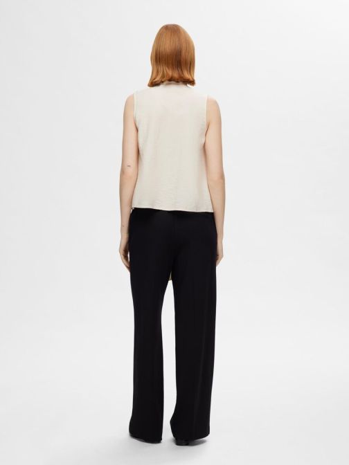 MEGKÖTŐS NYAKÚ BLÚZ 