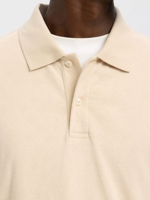 JACQUARD KÖTÉSŰ GALLÉROS PÓLÓ 