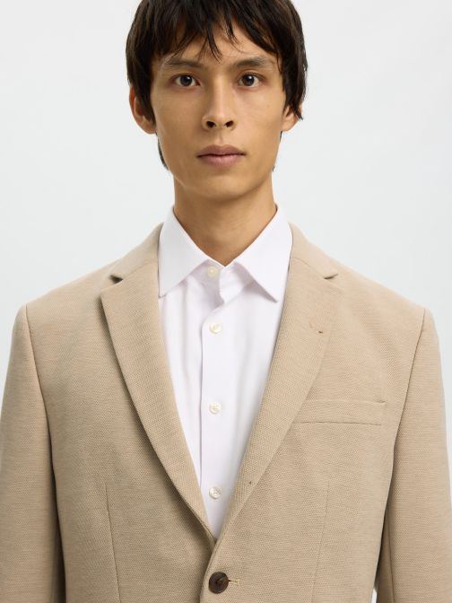 SLIM FIT ÖLTÖNYZAKÓ 